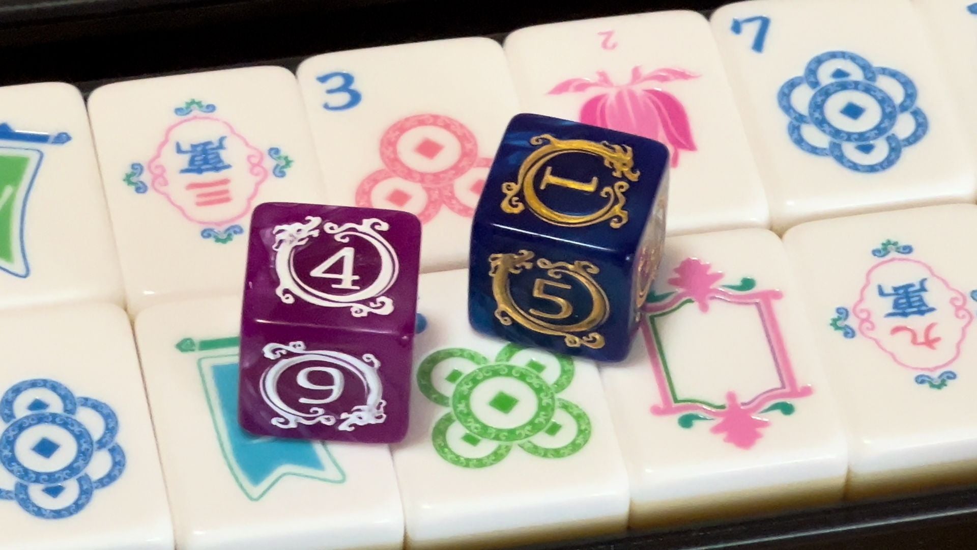 Premium dragon dice shown with real PANDATIME tile faces