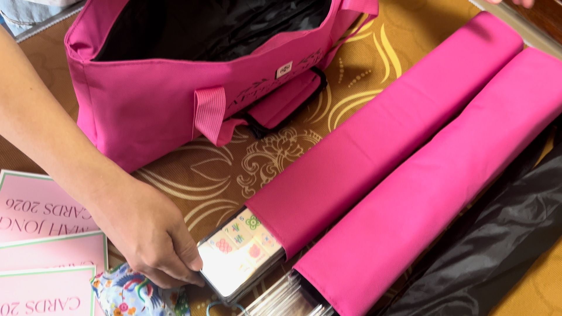 PANDATIME tile trays and rack sleeves being packed into an AFTER FOUR carrying bag