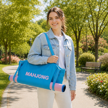 Blue canvas American Mah Jongg carrying bag — carrying view