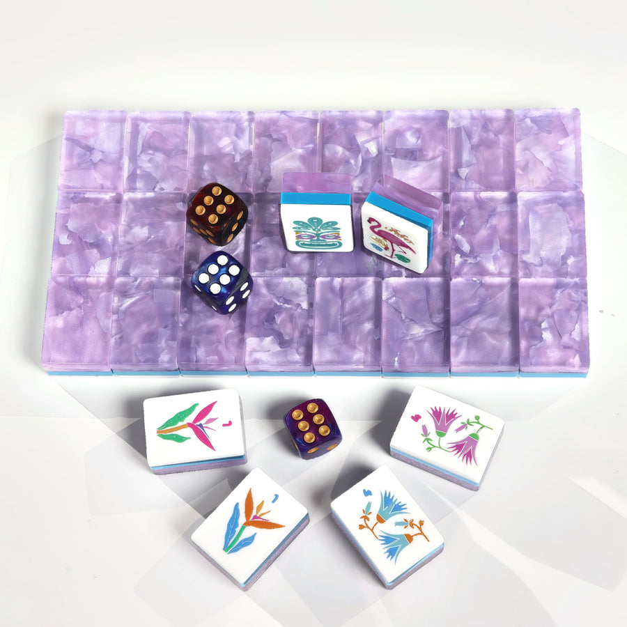 Amethyst Garden American Mah Jongg tile set with lavender marbled backs and tropical illustrated faces