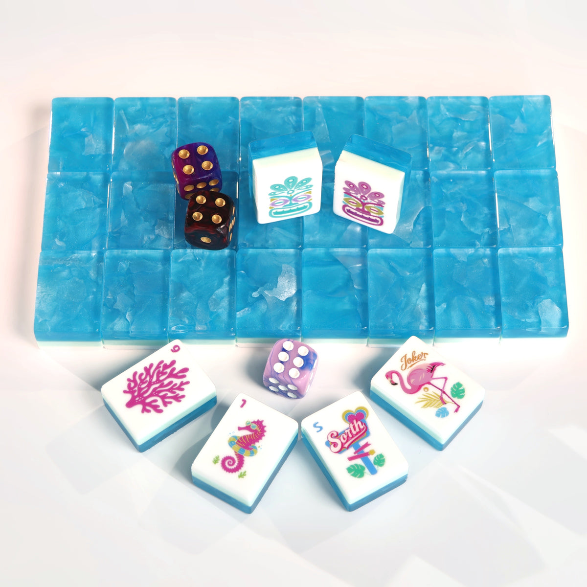 Azure Tropics American Mah Jongg tile set with aqua marbled backs and tropical illustrated faces