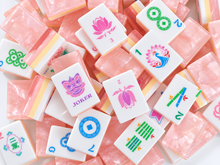 Scattered Blush Lotus American Mah Jongg tiles with lotus flowers, Joker masks and pink backs