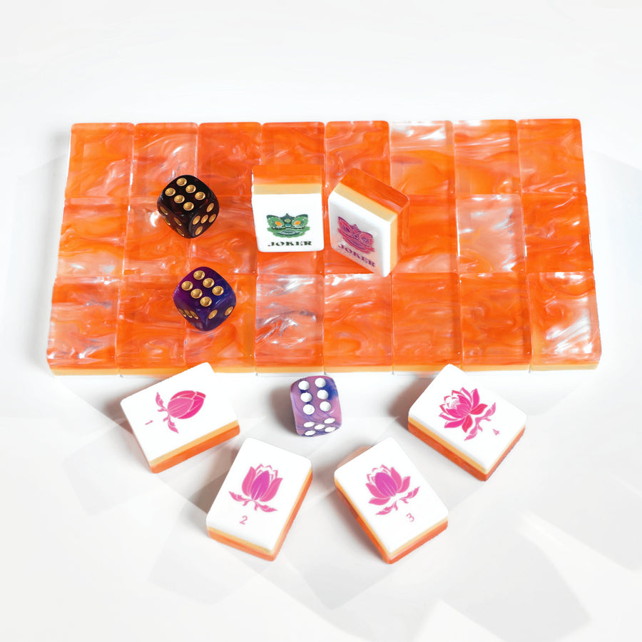 Coral Lotus American Mah Jongg tile set with orange marbled backs and pink lotus artwork