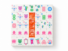 Coral Lotus American Mah Jongg tile designs arranged around an orange marbled back
