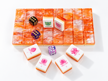 Wide product view of Coral Lotus American Mah Jongg tiles with orange marbled backs and styling dice
