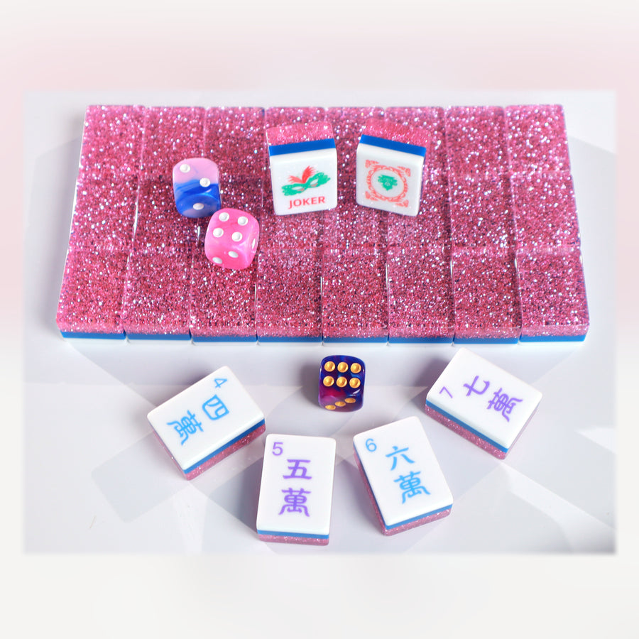 Pink Stardust American Mah Jongg tile set with pink glitter backs and colorful illustrated faces