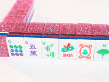 Front view of Pink Stardust American Mah Jongg tile wall with pink glitter backs
