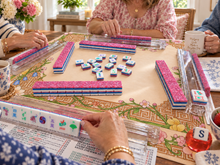 Pink Stardust American Mah Jongg tile set in play on a table with friends