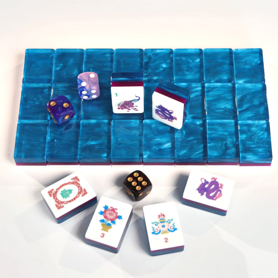 Sapphire Pavilion American Mah Jongg tile set with deep blue marbled backs and colorful illustrated faces