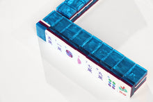 Angled view of Sapphire Pavilion American Mah Jongg tile wall with deep blue backs