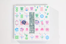 Sea Glass Lotus American Mah Jongg tile designs arranged around a pale green marbled back