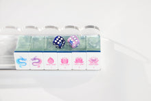 Sea Glass Lotus American Mah Jongg dragon and lotus tiles on a clear rack with styling dice