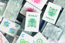 Sea Glass Lotus American Mah Jongg Joker tiles over pale green marbled backs