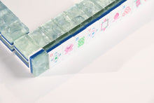 Close view of Sea Glass Lotus American Mah Jongg tile wall showing green backs and layered edges